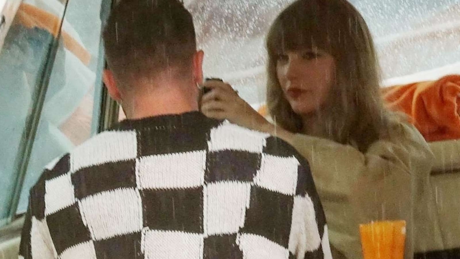 Taylor Swift ditches mobile for old camera to capture romantic Travis Kelce on 'rainy' boat ride in Italy