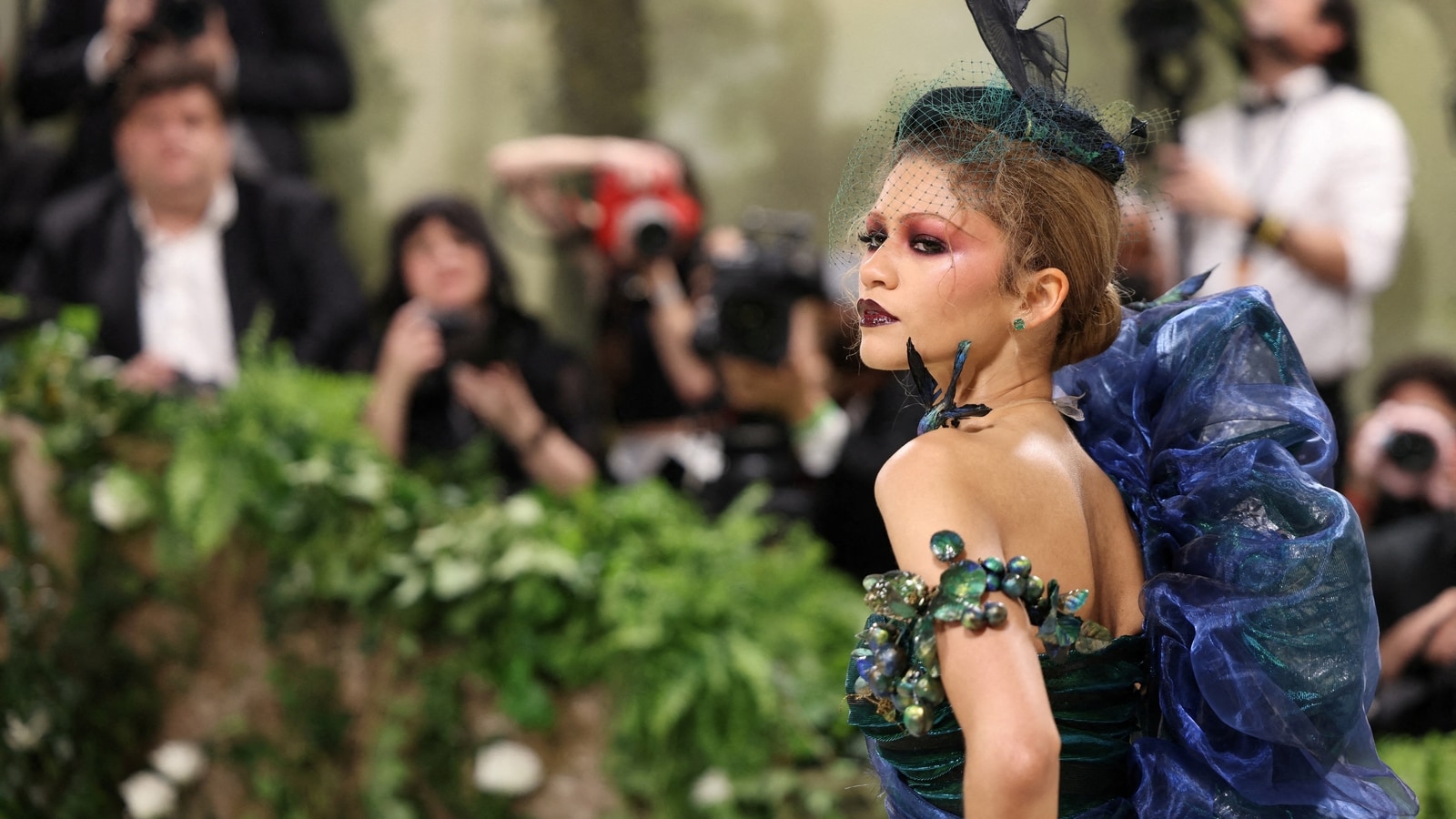 Zendaya arrives at garden-themed Met Gala in blue, glittery J.Lo