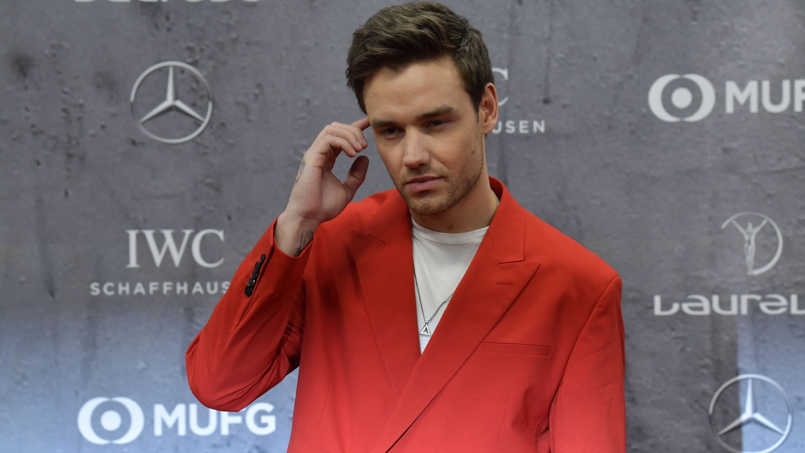 Why has Liam Payne’s body still not been handed over to his family in Britain?