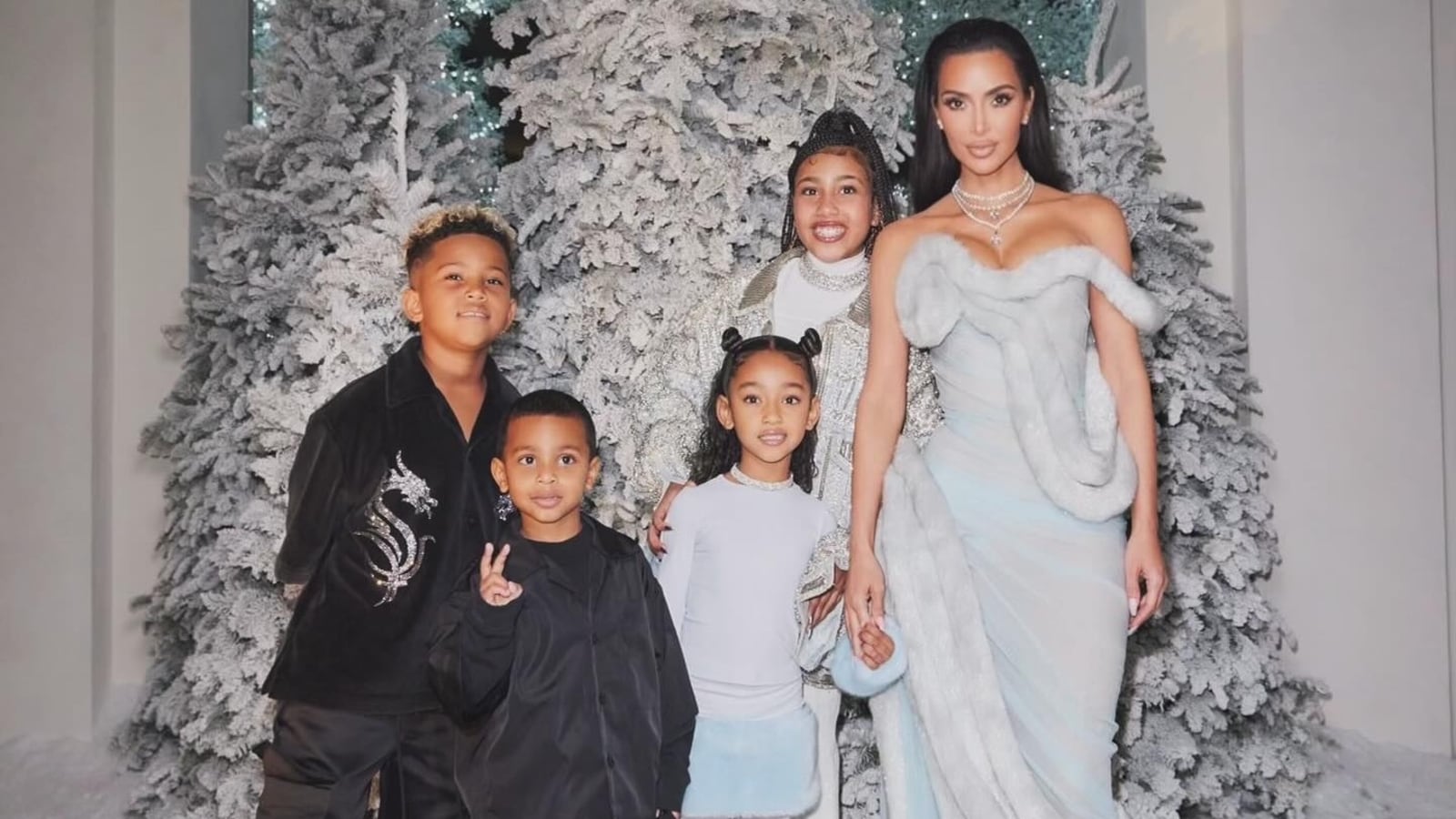 Kim Kardashian is keeping up a Christmas tradition started for kids by Kanye West. it is what it is